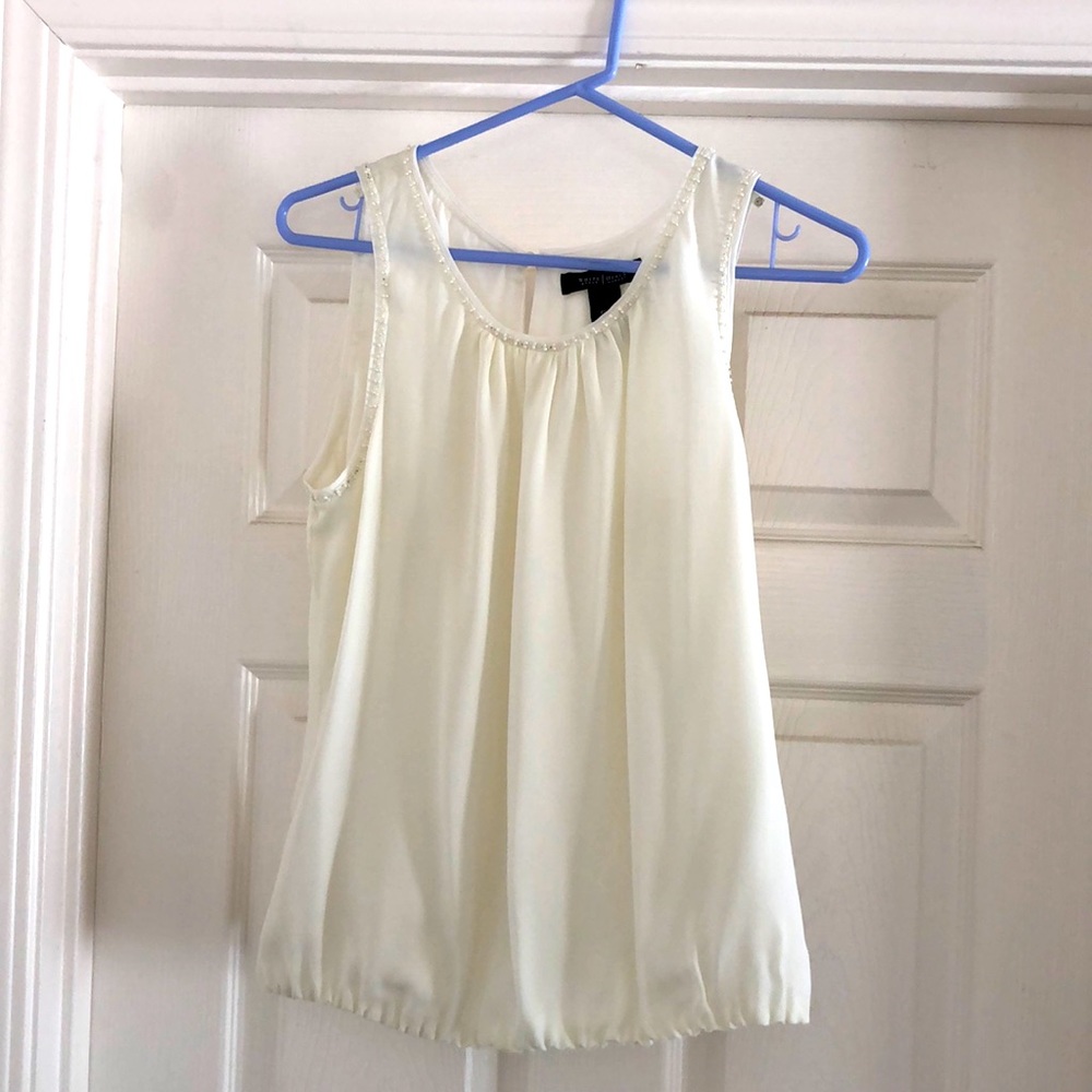 Sleeveless off white silk top